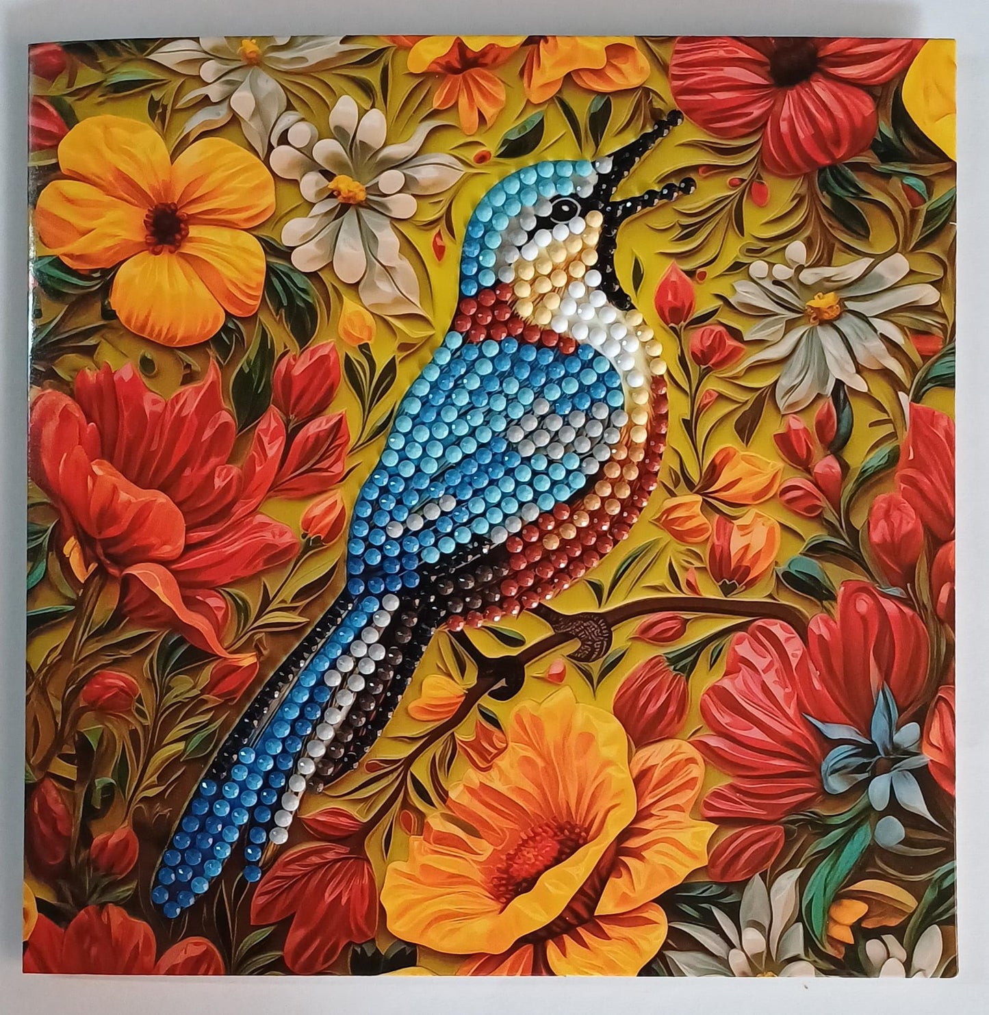 Blauwe zangvogel tussen bloemen wenskaart, diamond painting voltooid, 15 x 15 cm