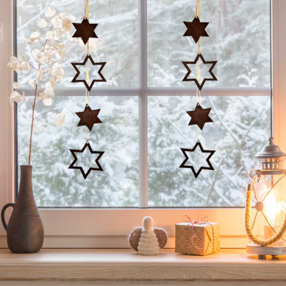 Roest metalen kerststerren set – open en gesloten ster