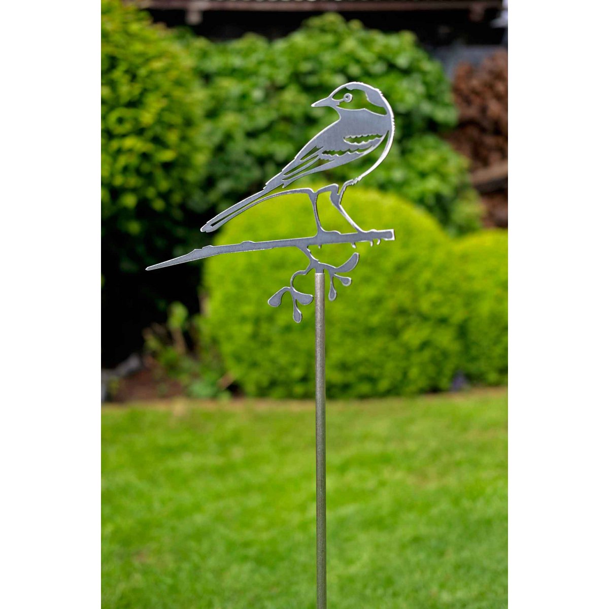 Metalen boomdecoratie kwikstaart