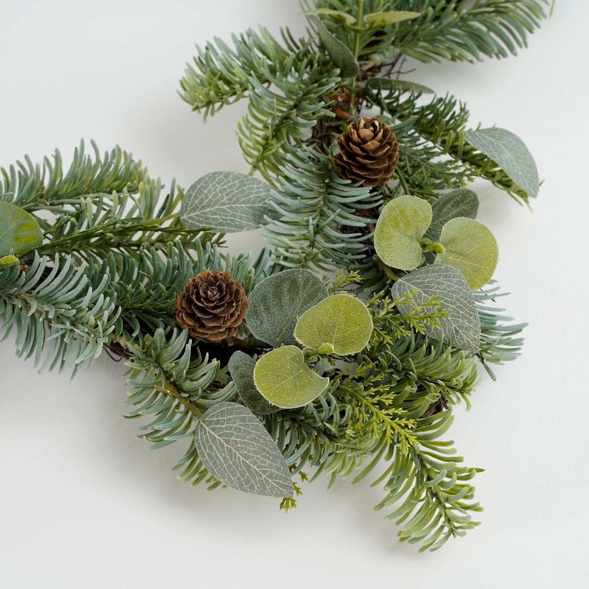 Kerstster met groen en dennenappels, 60 cm